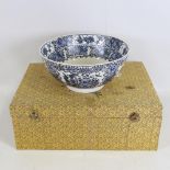 A Chinese blue and white porcelain bowl, with painted exotic birds and flowers, 6 character mark,