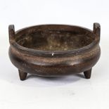 A Chinese bronze incense burner, impressed 6 character mark, diameter 14.5cm