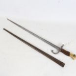 A French 1874 pattern sword bayonet, Francois Louis Henry Chatelleraut, original metal scabbard