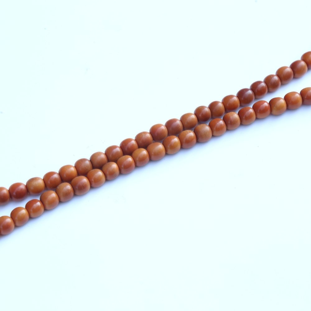 A string of honey coloured natural horn beads, possibly rhino horn - Image 5 of 20