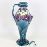 A Minton secessionist ceramic vase, pattern no. 3, with relief moulded designs, height 31cm, 1