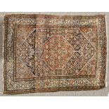An antique Persian Farghen rug, 193cm x 137cm