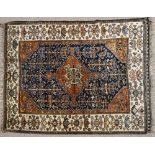 An antique Persian Afsher rug, 166cm x 126cm