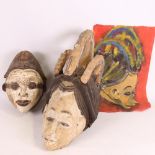 2 African carved and painted wood Tribal masks