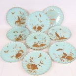 A set of 10 Spode china cabinet plates, 1884, hand gilded and painted on duck egg blue ground,