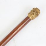 19th century gilt-bronze handled walking cane, with multi-faced Greek God design handle, length 86cm