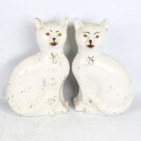 A rare pair of 19th century Staffordshire Pottery seated cats, height 34cm No chips cracks or