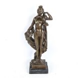 A reproduction patinated bronze sculpture, female nude, unsigned, on black marble base, height 43cm