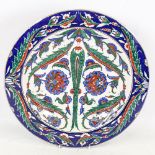 19th century Turkish Iznik pottery plate, with hand painted decoration, diameter 36cm