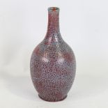 A crackle glaze ceramic bottle vase, turquoise/iron red glaze, height 18cm