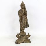 An Oriental patinated bronze figure, height 26cm