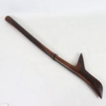 An Aboriginal hardwood throwing club, probably early 20th century, length 68cm