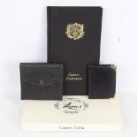 A Franco Maria Ricci address book, original box, a Gucci leather-bound pocket phone book, and a