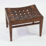 Arthur Simpson of Kendal, Arts and Crafts stool in oak, with original woven leather strap seat,