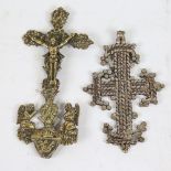 An Ethiopian cross pendant, length 12cm, and a Continental relief cast-brass cross, height 16cm (2)