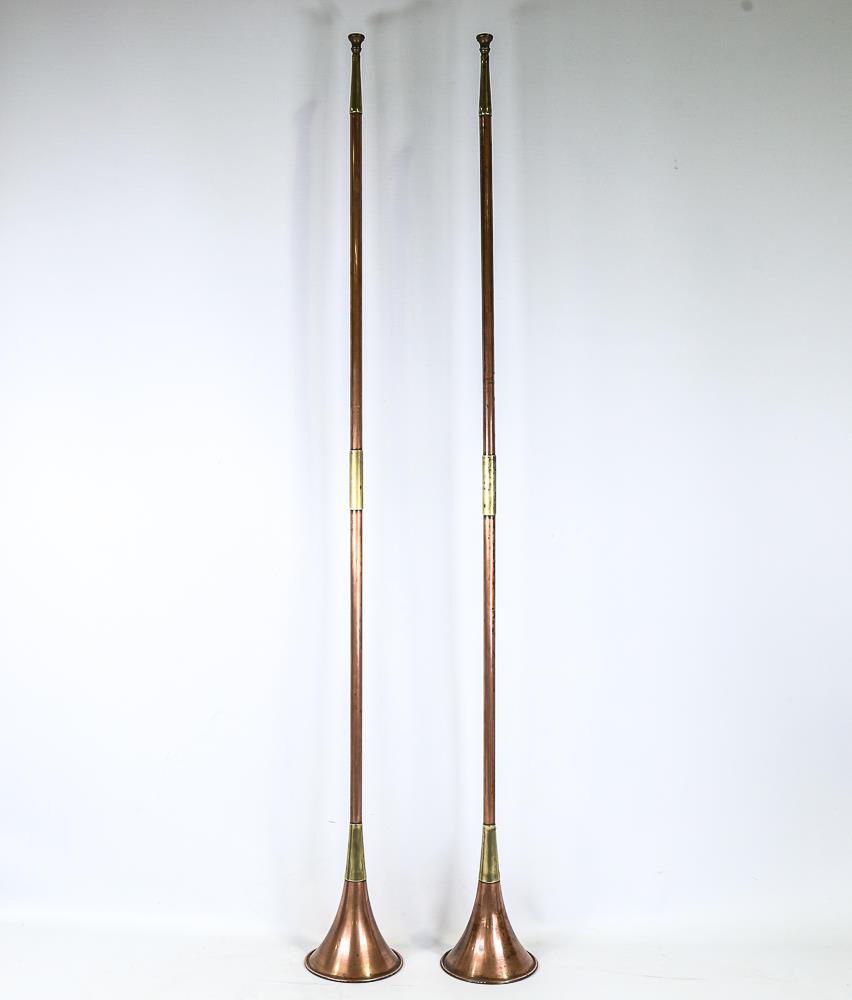 A pair of late 19th century copper and brass coaching horns, length 121cm