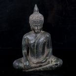 An Oriental patinated bronze seated Buddha, thought to be 15th/16th century, height 14.5cm