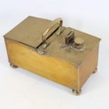 A George III brass tavern honesty tobacco box, circa 1800, central carrying handle, with 2 lidded