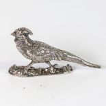 A Victorian Continental novelty silver pheasant pepperette, circa 1900, import hallmarks for
