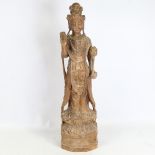A Chinese carved wood figure of Guan Yin, early to mid-20th century, height 17cm