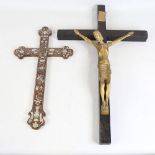 A gilt-bronze and ebony crucifix, length 63cm, and a mother-of-pearl and rosewood inlaid cross,