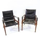 M HYAT & BROS LTD, a pair of hardwood and leather safari chairs, makers label on frame, height 78cm