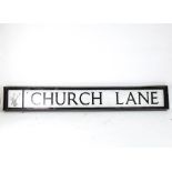 A steel-framed Church Lane road sign, with stag's head motif, length 115cm