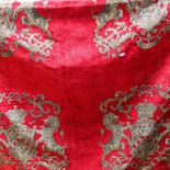 A pair of red chenille throws with Heraldic design, length 212cm, width 140cm