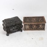 A Japanese silver plate on copper cherub box, and another Antique lead example, width 13cm (2)