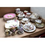 A quantity of various ceramics, including teacups, Royal Worcester plates, Doulton figures etc