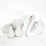 Lladro porcelain swan, height 18cm, and a pair of Lladro doves