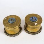 A pair of trench art brass cannon shell case boxes, with inset Wedgwood blue and white Jasperware