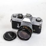 CANON - a Vintage TX 35mm single lens reflex camera, with Canon 50mm 1:1.8 lens and Hunter 55mm