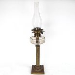 A brass Corinthian column oil lamp, height 70cm
