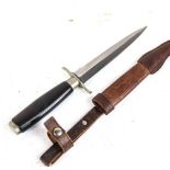 A combat knife by Carl Schlieper of Germany and scabbard, blade length 15.5cm