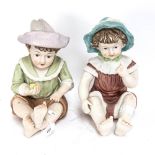 A large pair of Continental porcelain infant figures, unmarked, height 30cm