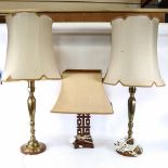 An Oriental design table lamp and shade, height 54cm, and a pair of brass table lamps with shades