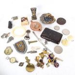 A box of interesting items, including badges, bell, miniature shoe, Royal memorabilia, oil lamp etc