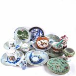 Oriental plates with painted fish decoration, a ginger jar, lidded mugs etc