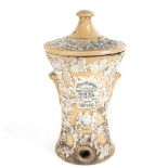 A Victorian Lipscombe & Co stoneware water filter, with coat of arms, applied decoration and