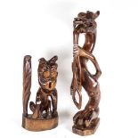 An Oriental carved hardwood figure of a dragon, inscribed under, height 58cm, and a carved