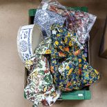 A box of Vintage fabrics, evening bags, cap etc