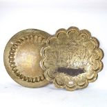 2 Eastern brass table-tops with engraved decoration, largest 60cm