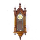 An Antique walnut-cased Vienna regulator wall clock in Gothic style, L104cm