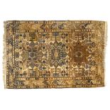 A cream ground Persian design rug, 175cm x 118cm