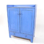 A blue painted cabinet, with 2 panelled doors and drawer under, W90cm, H120cm, D42cm