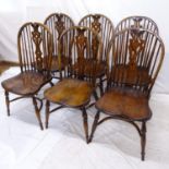 A set of 6 oak and elm-seated stick-back dining chairs, with crinoline stretchers