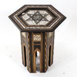 An Anglo-Indian octagonal hardwood table of Moorish design, with inlaid mother-of-pearl