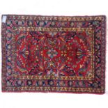 A red ground Hamadan rug, 137cm x 106cm