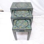 A nest of Indian or Persian scraffito decorated coffee tables, widest 48cm